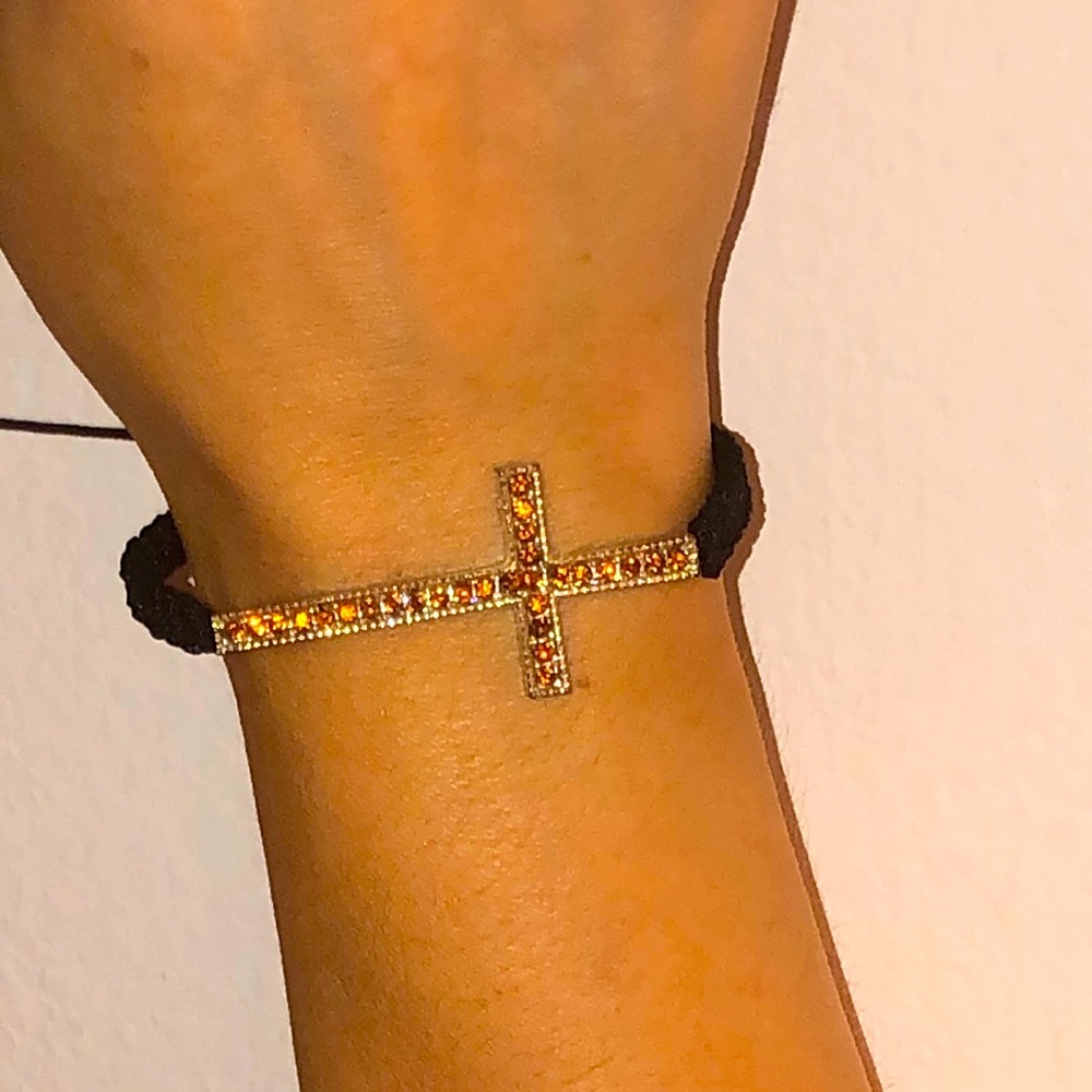 Amber bedazzled cross bracelet